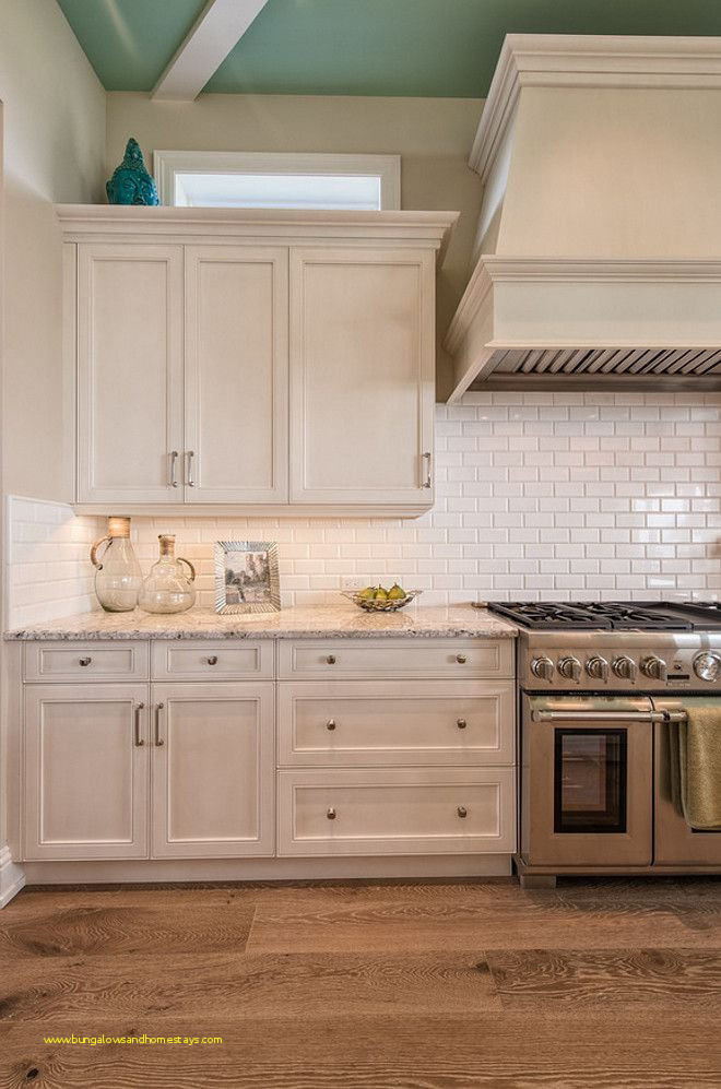 neutral backsplash tile neutral tile neutral tile light kitchen stove ideas dark cabinets neutral kitchen tile