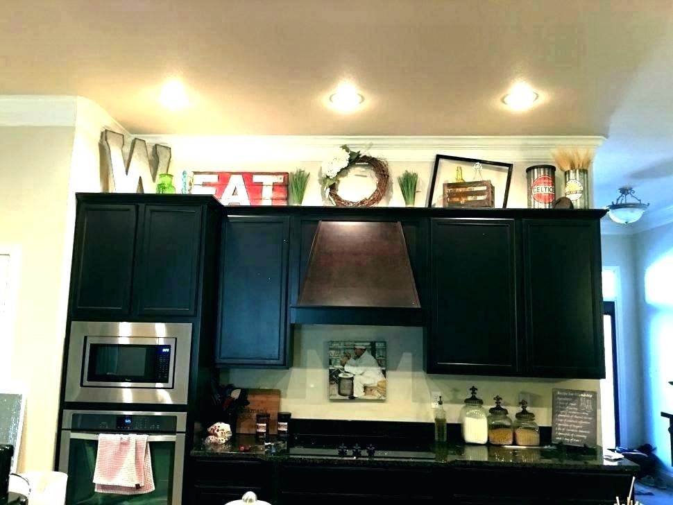 above kitchen cabinet decor
