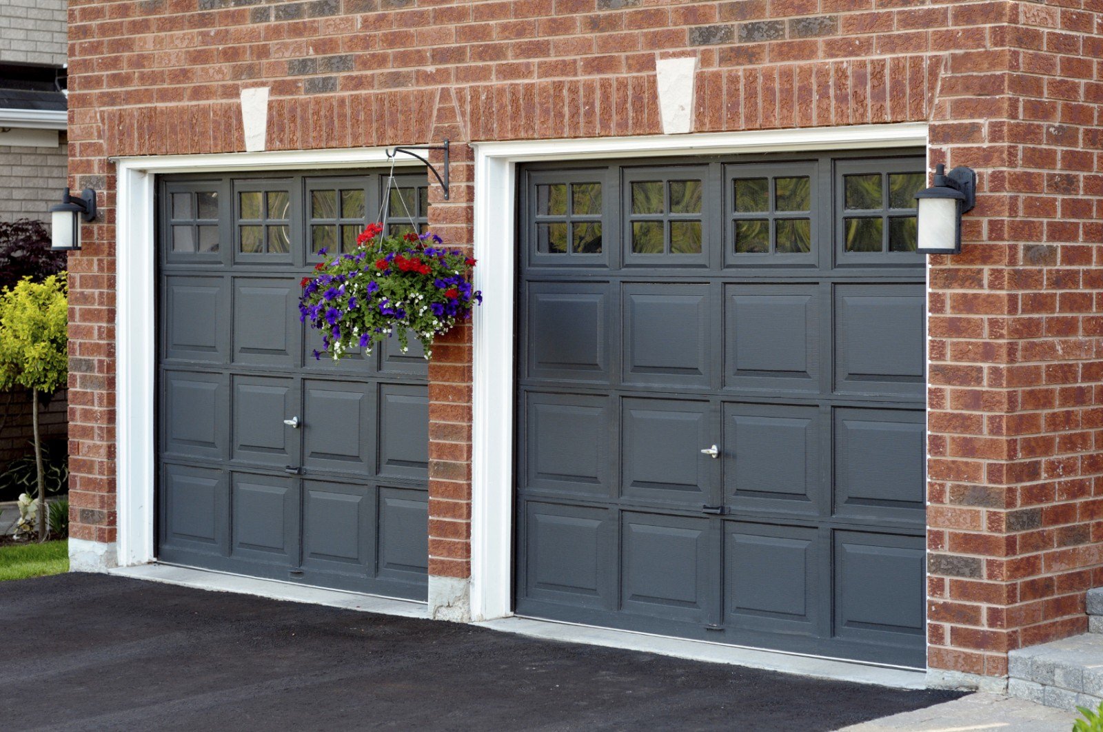 white house with black garage