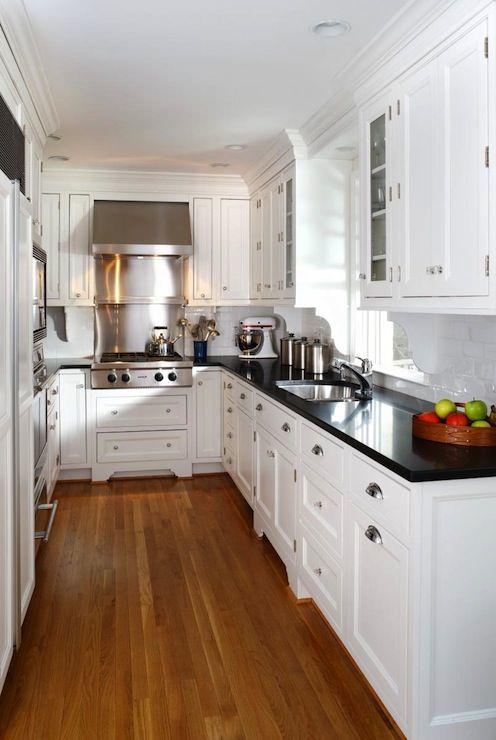 in gallery Giant chandelier above the kitchen counter steals the  spotlight here [Design: VSP Interiors]