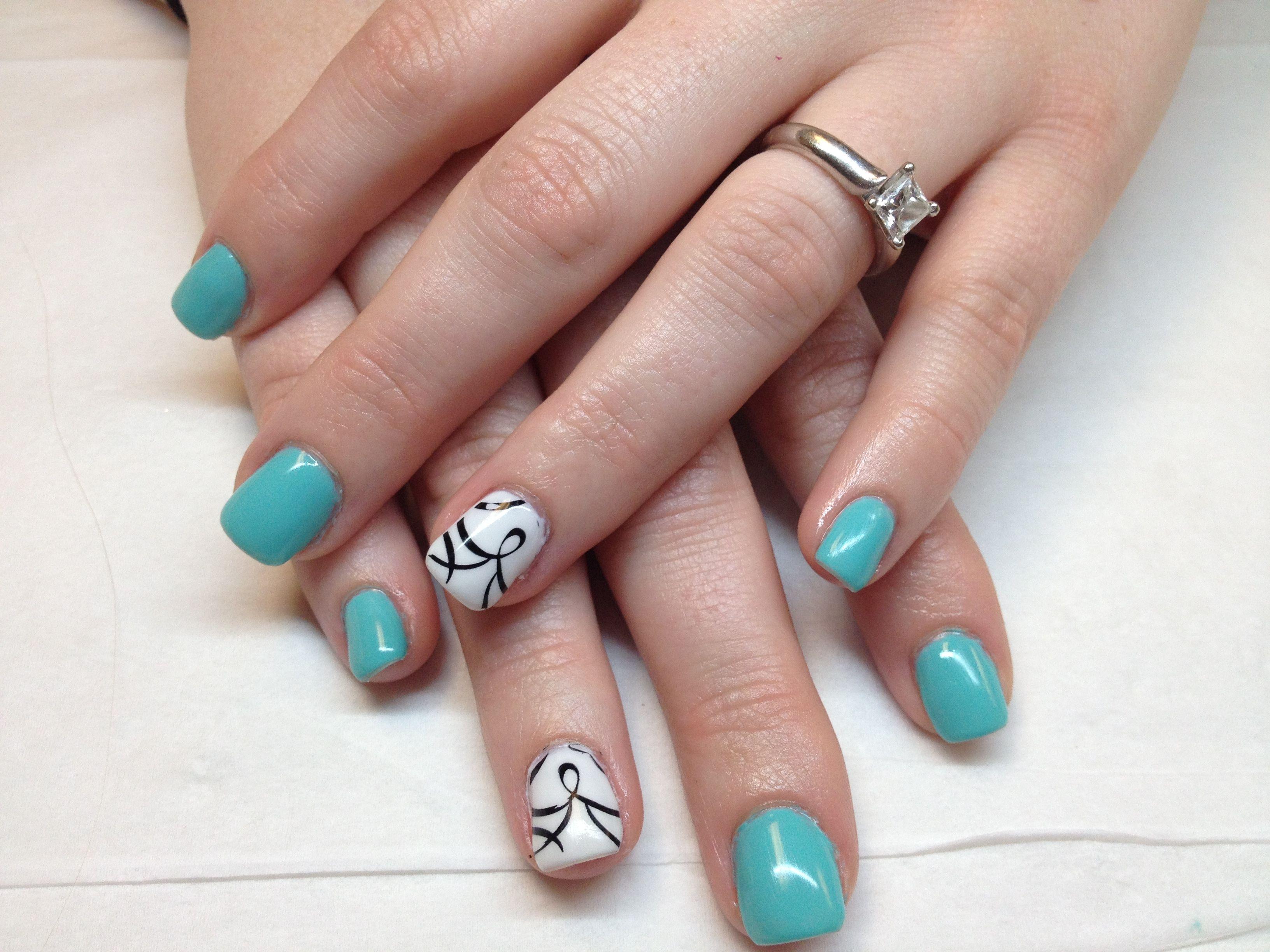 Teal black and white gel with freehand leopard print nail art