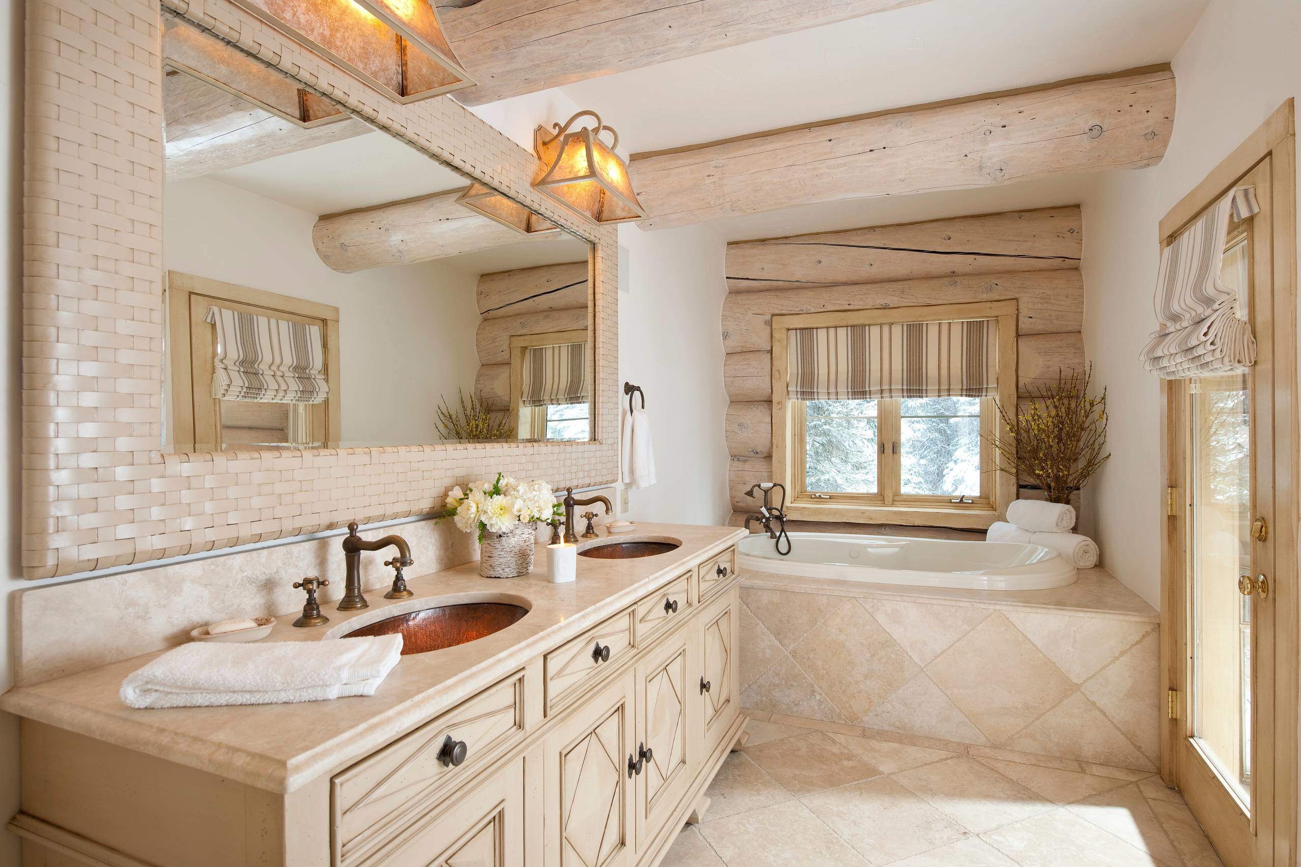 Plastered walls bring rustic magic to the charming bathroom [Design:  Cabinet Concepts by Design