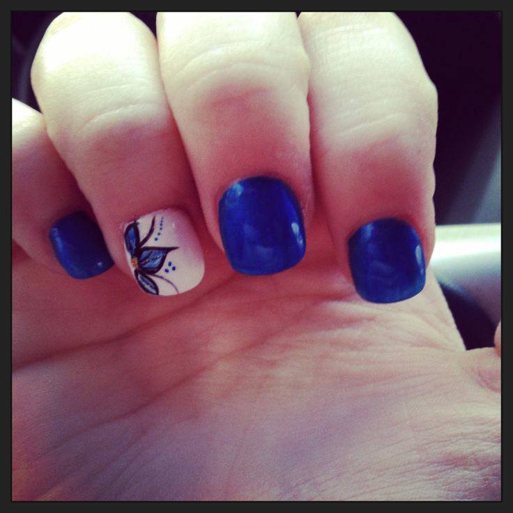 Color: Kiss Products Impress Blue Gel Nails with Red & White Design