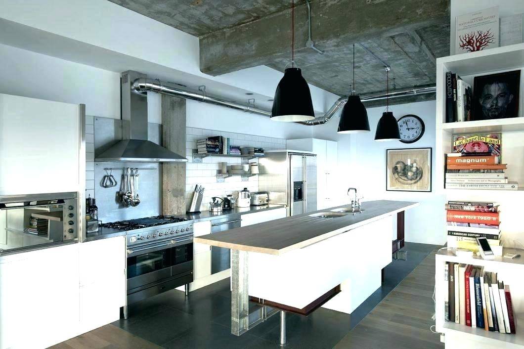 Modern take on industrial style kitchen design where metal surfaces are stainless steel