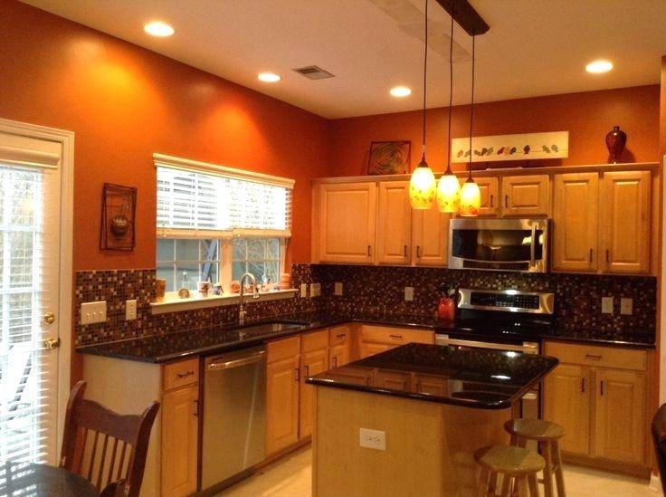 A coat of paint will instantly revive old kitchen cabinets