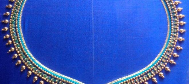 So if you do not want to your blouse design to be too elegant, then you can  opt for the round back neck blouse design, which has a simple and plain  look,