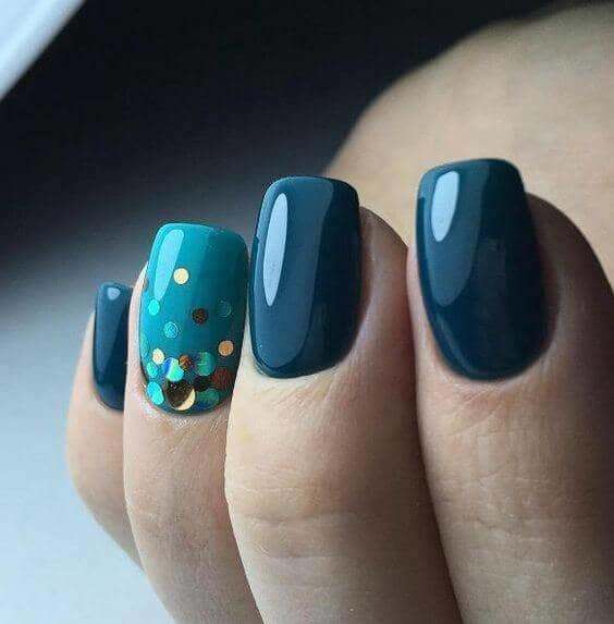 White tips with teal, black and silver