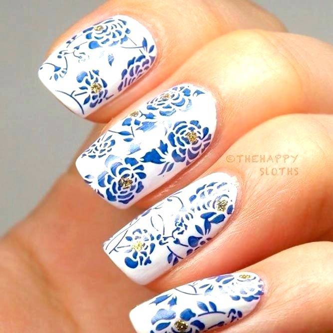 However, this color combined with some blue flowers and polka white dots make up the most lassie gel nail design