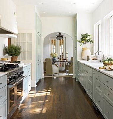 Incorporating a breakfast area into your galley kitchen design can make the space more inviting to friends and family