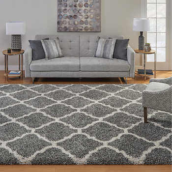 If you have a large living room, sometimes it makes sense to create two separate seating areas in order to break up space and make it feel more open and