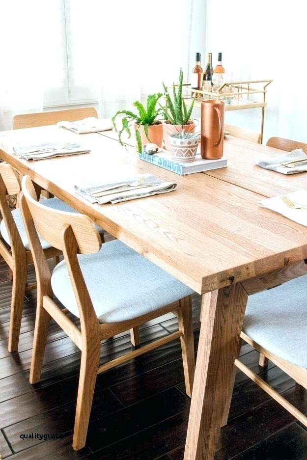 The Olten Light Oak dining table and matching chairs would make a stunning addition to any kitchen or dining room