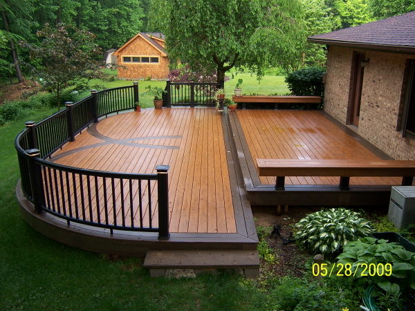 If you have an above ground pool, placing a deck around it is an excellent idea for many reasons