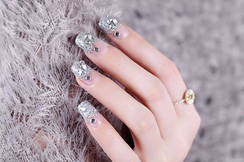 The professionally designed marble on accent nail with the remaining